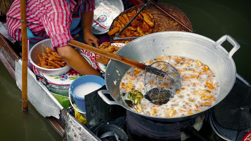 Woman Cooking Bananas - River Market