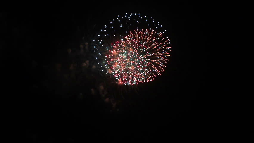 a display of fireworks in the night sky