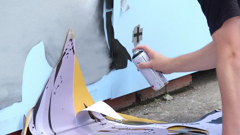 BRISTOL - JULY 25th 2015: Europe’s largest, free, street art & graffiti festival - street artist making mural and graffiti - Upfest Festival 2015 -  Bristol, UK.