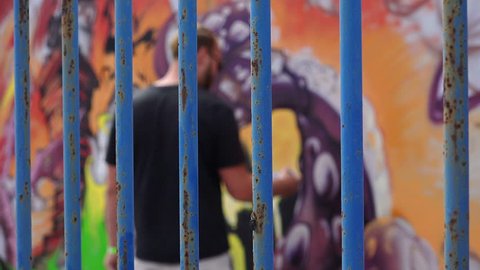 BRISTOL - JULY 25th 2015: Europe’s largest, free, street art & graffiti festival - street artist making mural and graffiti - Upfest Festival 2015 -  Bristol, UK.