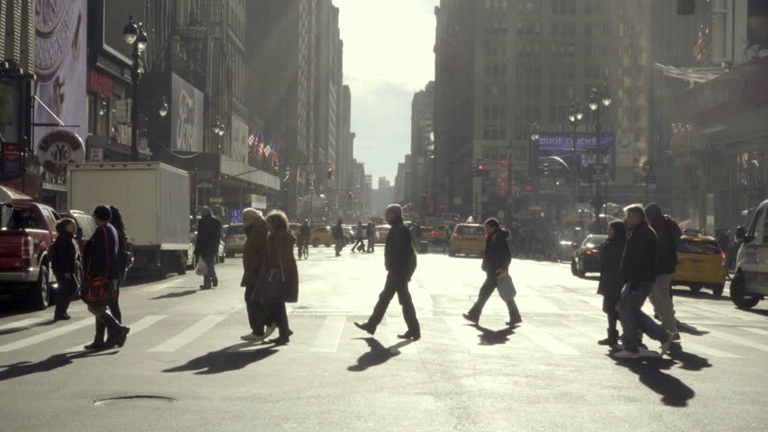 NEW YORK - NOV 29, 2015: people crossing street in slow motion, cars driving across busy intersection in Manhattan NYC. Manhattan is one of the smallest yet most populous of the 5 boroughs. | Shutterstock HD Video #13400912