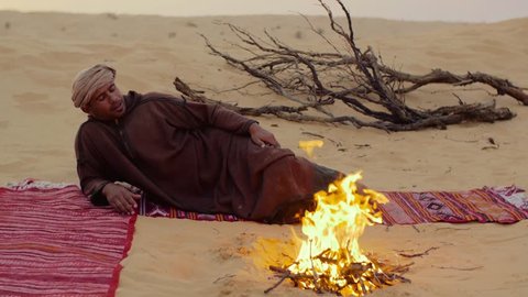 sahara man near a fire