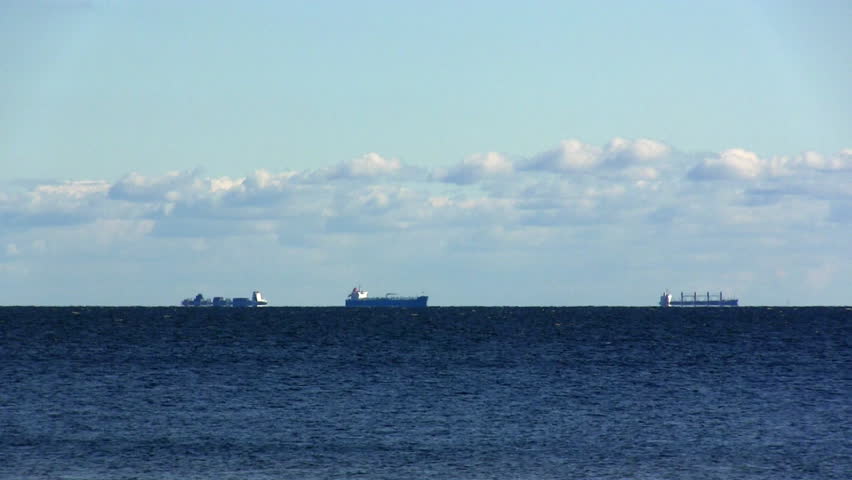 cargo ships waiting for the pilot