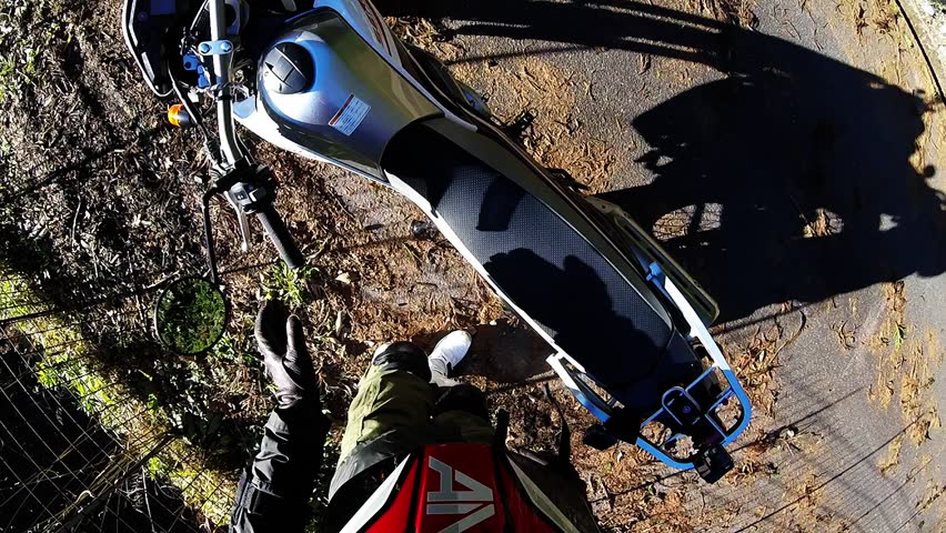 Helmet view. Off-road riders are preparing for the start.