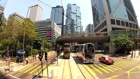 HONG KONG, CHINA – SEPTEMBER 13, 2012: View from the upped deck of the double-deck tram passing by the street of Hong Kong, China.