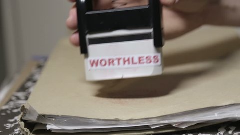 Shot of Worthless rejection stamp
