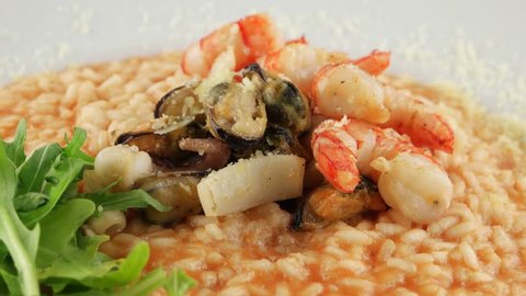 Cooked plate of rice (risotto) with seafood