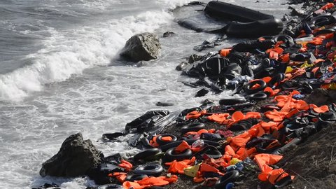 LESVOS, GREECE October 05, 2015. Life jackets, rubber rings an pieces of the rubber dinghies discarded on a beach near Molyvos. Eftalou and Skala Sikaminia. Lesvos has been a hot spot for refugees.