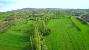 Aerial shot of a rural landscape in spring day
