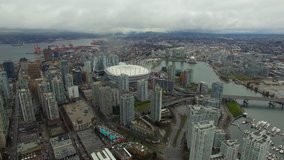 Aerial video of downtown Vancouver BC in Canada on an overcast day.