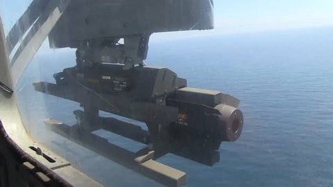CIRCA 2010s - Hellfire missiles are fired from a MH-60 Seahawk helicopter.