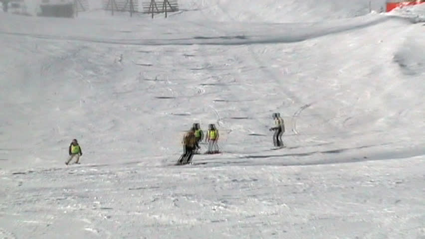 Ski resort. Group of children are studying ski.