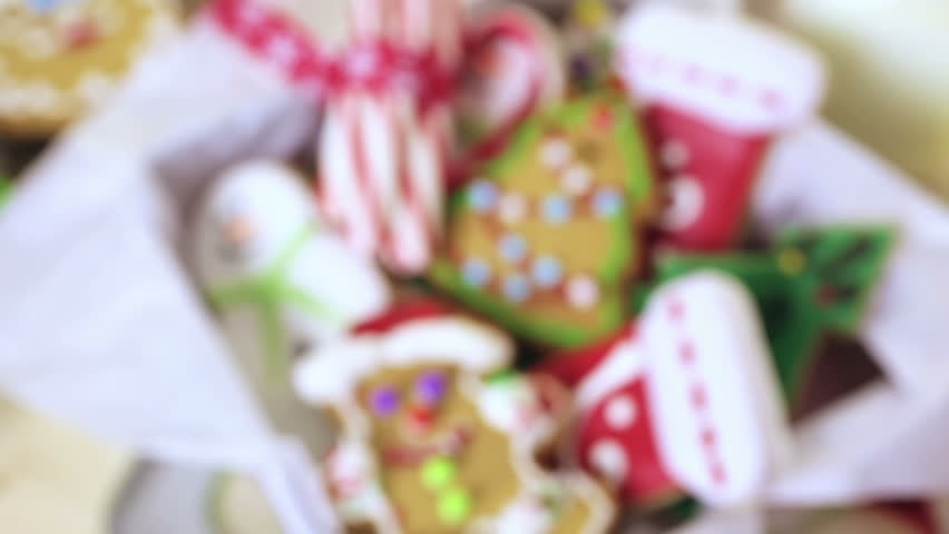 Home made Christmas cookies decorated with colorful icing. | Shutterstock HD Video #13498118