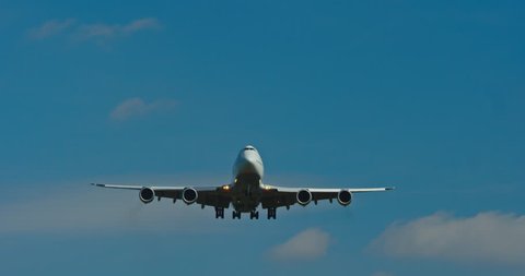 Boeing 747 from the front landing at an Airport
