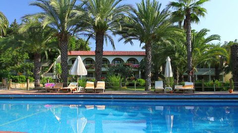 Luxurious hotel in Turkey with pool and palm trees 