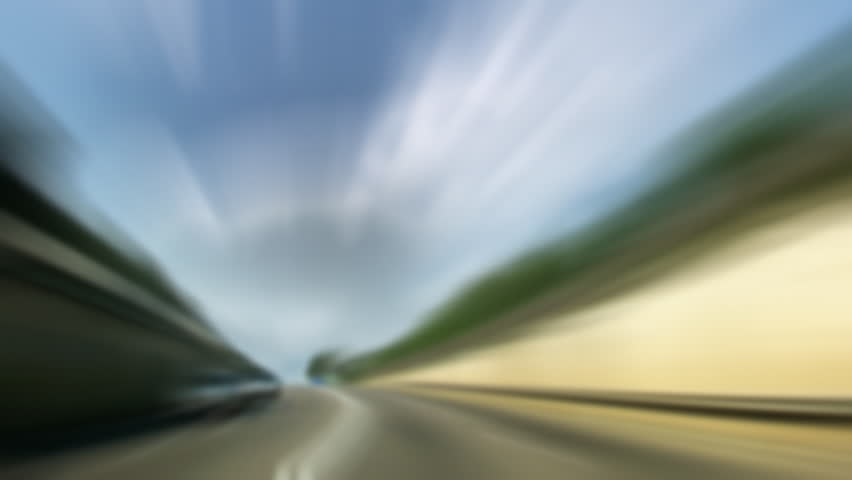 Road speed tunnel and rain drops on wind shield