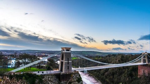 Sunrise at Clifton Suspension Bridge, Bristol with sunlight catching top of towers at the end