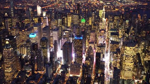 helicopter aerial shot of new york city metropolis skyline at night. shot on red epic 4K