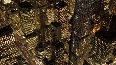 helicopter aerial shot of new york city metropolis skyline at night. shot on red epic 4K