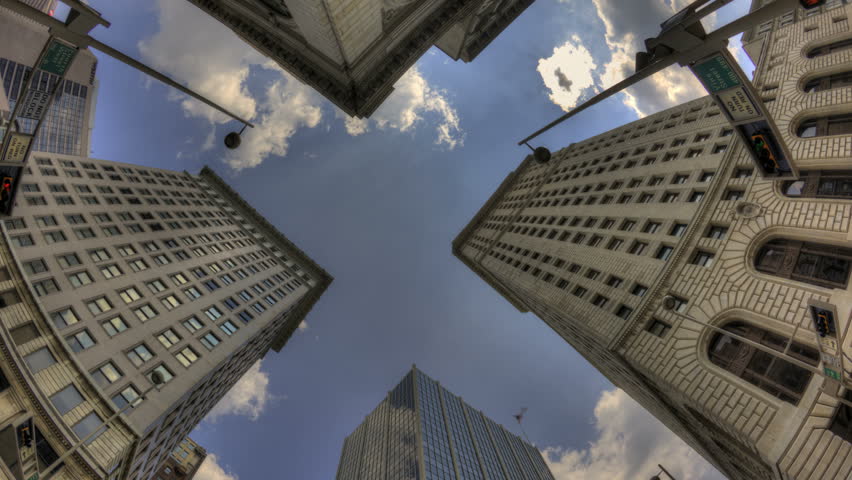 Timelapse of cloudes above Skyscrapers with a fisheye lens 