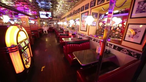 MOSCOW - JAN 18, 2015: Jukebox and interior of Beverly Hills Diner - network of stylized American restaurants in Moscow