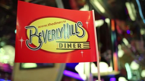 MOSCOW - JAN 18, 2015: Small flag in Beverly Hills Diner - network of stylized American restaurants in Moscow