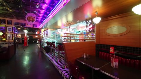 MOSCOW - JAN 18, 2015: Illuminated bar in Beverly Hills Diner - network of stylized American restaurants in Moscow