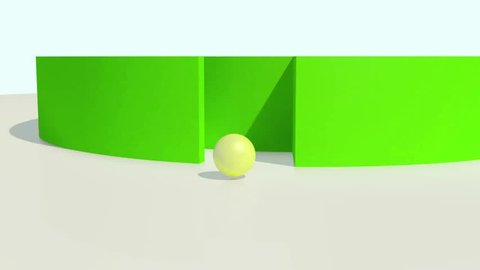 Small yellow ball goes through labyrinth