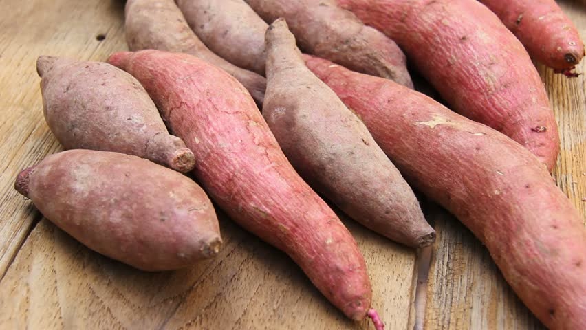 closeup sweet potatoes  Royalty-Free Stock Footage #13588883