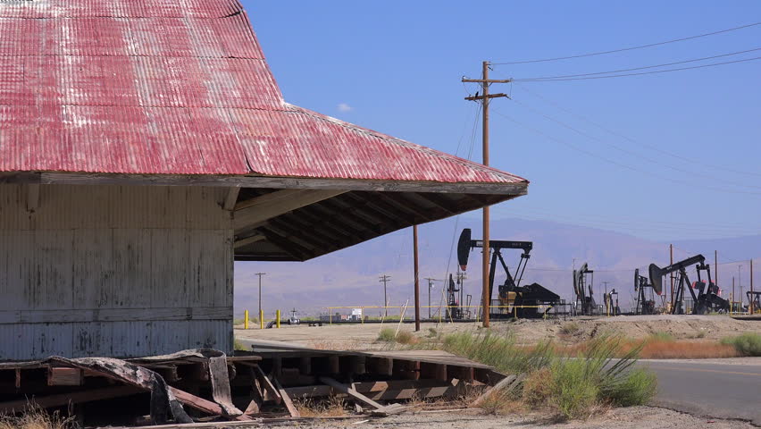 BAKERSFIELD, CALIFORNIA - CIRCA 2015 - Oil fields and derricks near Bakersfield, California.
