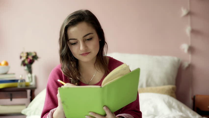 Teenage Girl Writing in Her Stock Footage Video (100% Royalty-free)  13606628 | Shutterstock