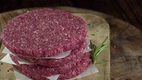 Raw Burger Meat (beef) as seamless loopable rotating 4K footage