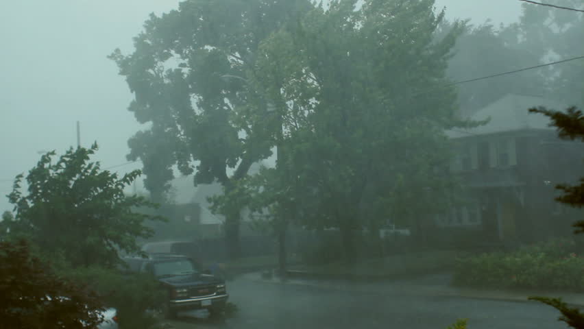 Scary suburban storm. Very strong summer storm with close to hurricane force winds. Thunder and lightning. East York, Ontario, Canada. 