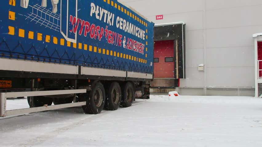 Parking unloading cargo from truck to warehouse.  28 November 2015 Novosibirsk | Shutterstock HD Video #13620506