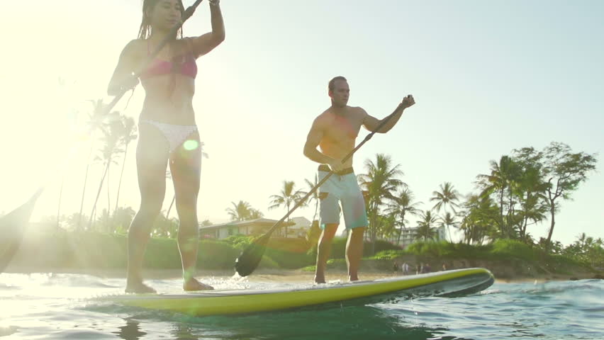 Happy Couple Stand Up Paddle Surfing, Summer Sport 