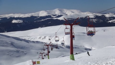 Romania, Sinaia, February 8, 2015, People Riding Chairlift in Alps Timelapse, Alpine, Winter Sports, Skiing Slope