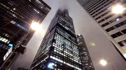 timelapse of clouds at dusk over the Sears Tower in Chicago