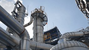 Oil Refinery plant with blue sky , 4K video panning