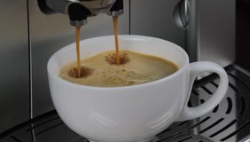 Coffee machine pouring espresso in cup macro image. ( 1080 HD Silent Video )