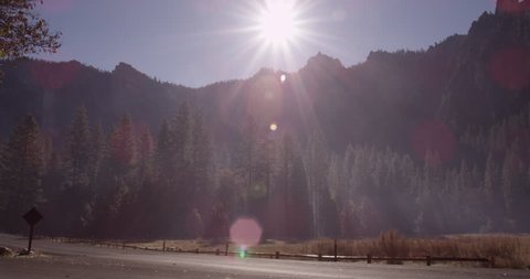 Sun breaking over Yosemite National Park, California. 4K footage shot with RED EPIC CAMERA.