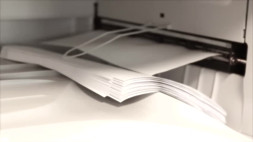 Copy Machine spits out paper