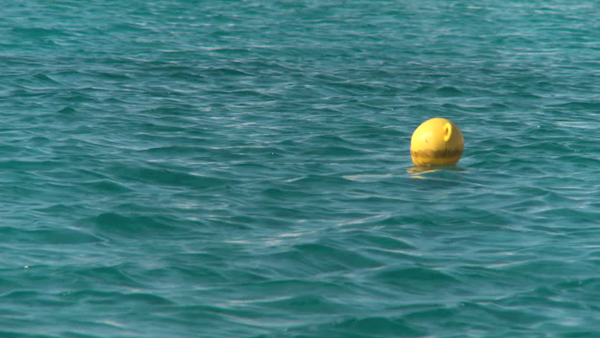 Yellow Buoy in the ocean