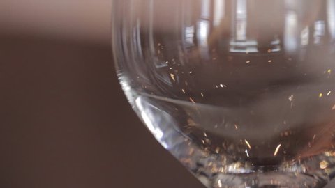 Wine is poured into a glass