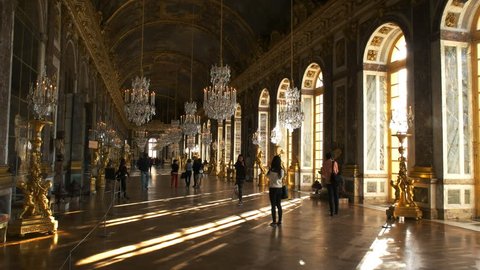 VERSAILLES, PARIS, FRANCE- SEPTEMBER 23, 2015: sunlight streams into the dazzling hall of mirrors in the palace of versailles