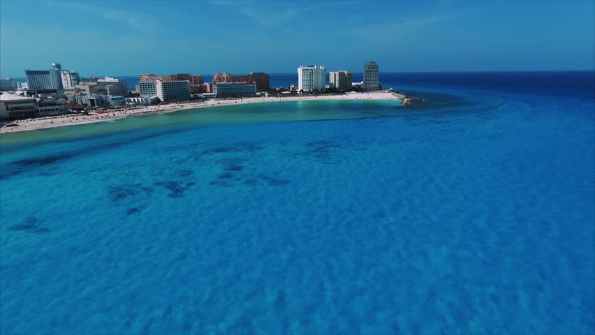 Cancun Mexico featuring aerial view, beach, blue ocean.