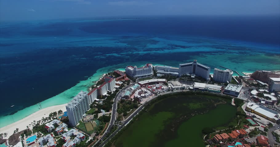 Cancun Mexico featuring aerial view, beach, blue ocean.