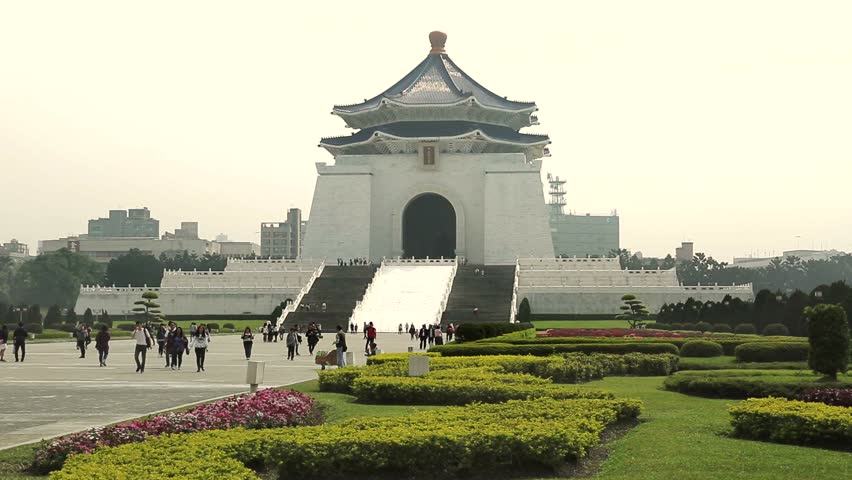 Entrance to Chiang Kai Shek memorial in Taipai, Taiwan, with tourists in foreground.