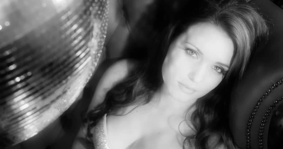 stunning sexy disco woman surrounded by disco balls