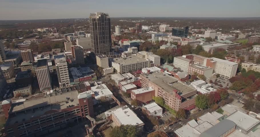 Aerial footage of downtown Raleigh, NC.  Shot from above Moore Square.