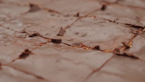 Glazed  and cracked chocolate cake surface close-up 4K 2160p 30fps UltraHD footage - Tasty looking mouth watering chocolate cake texture 4K 3840X2160 UHD video